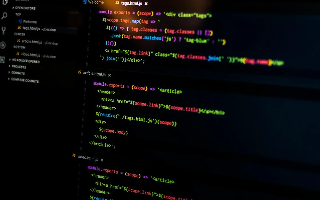 A modern computer screen displaying web design work, showcasing creative visuals in a workspace.